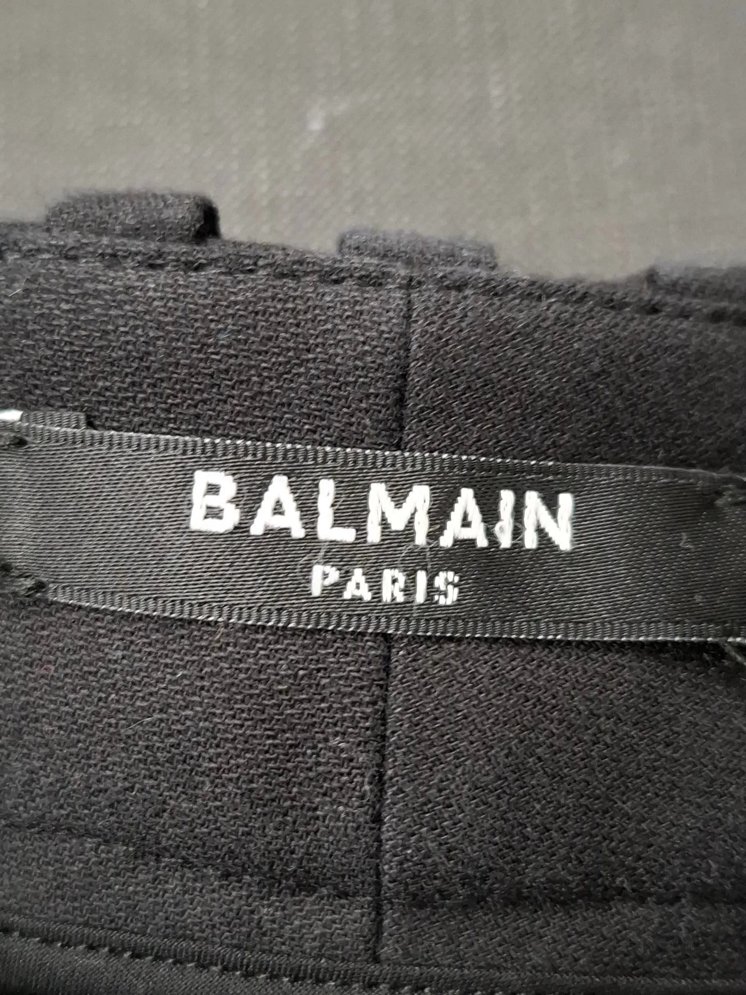 Pantalon droit court drapé Balmain en laine noire