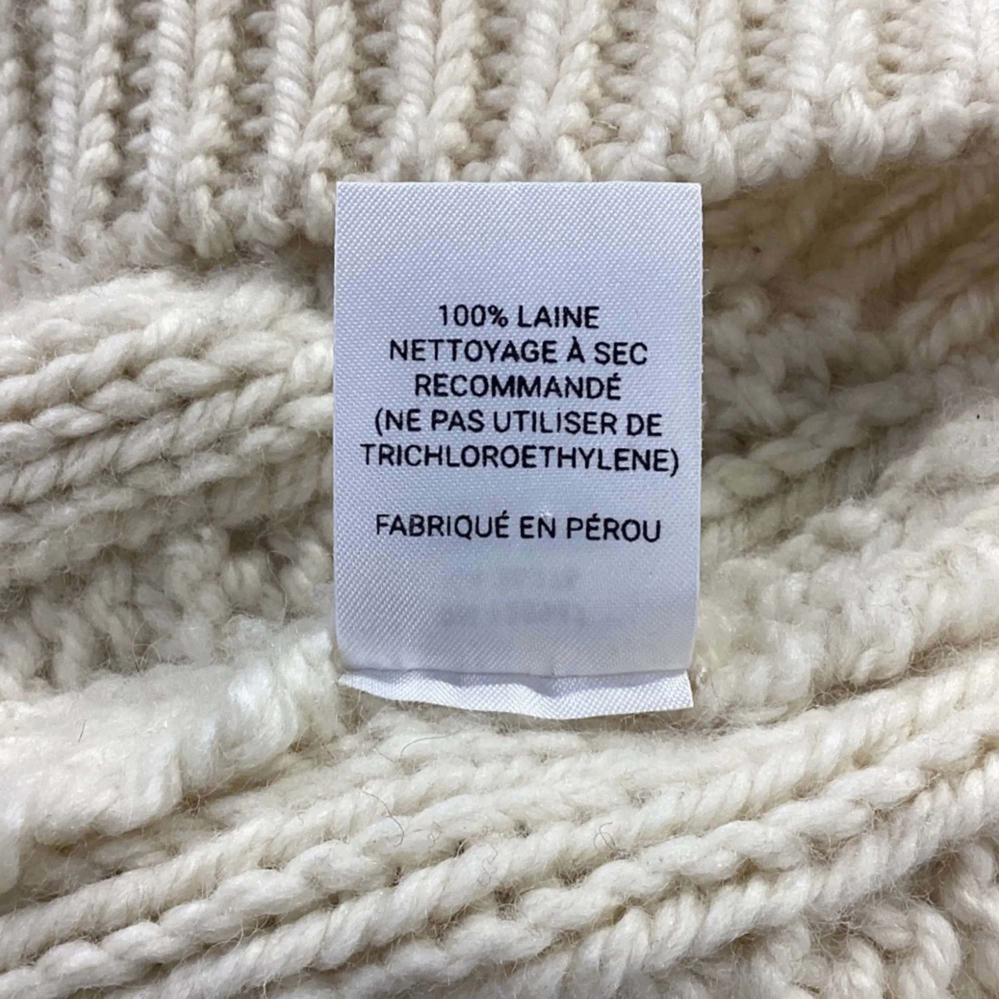Pull col roulé en laine crème à motif câble Hawthorne de Nili Lotan
