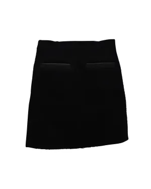 Mini-jupe en laine noire avec garniture en cuir Theory